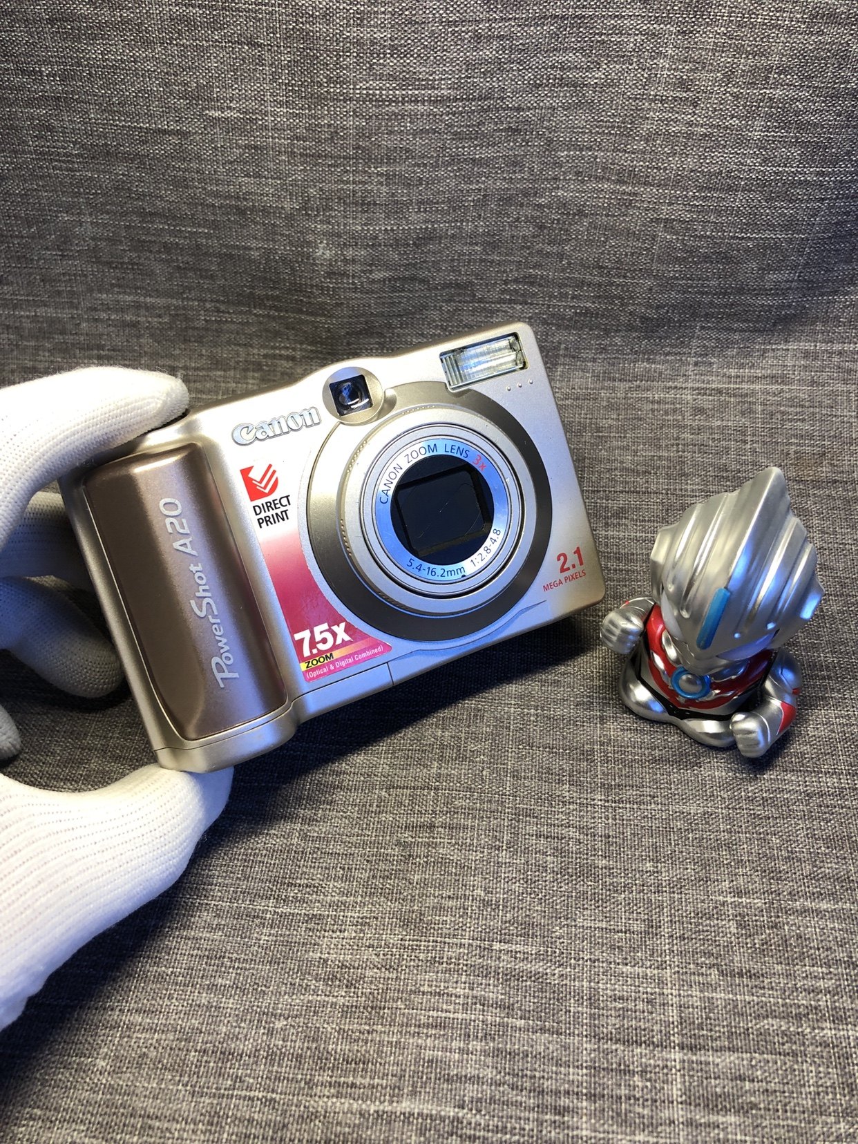 canon佳能powershota20ccd胶片感变焦数码210w像素