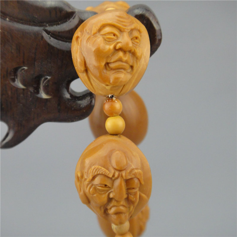 苏州核雕名家周建民《铁核十八罗汉》