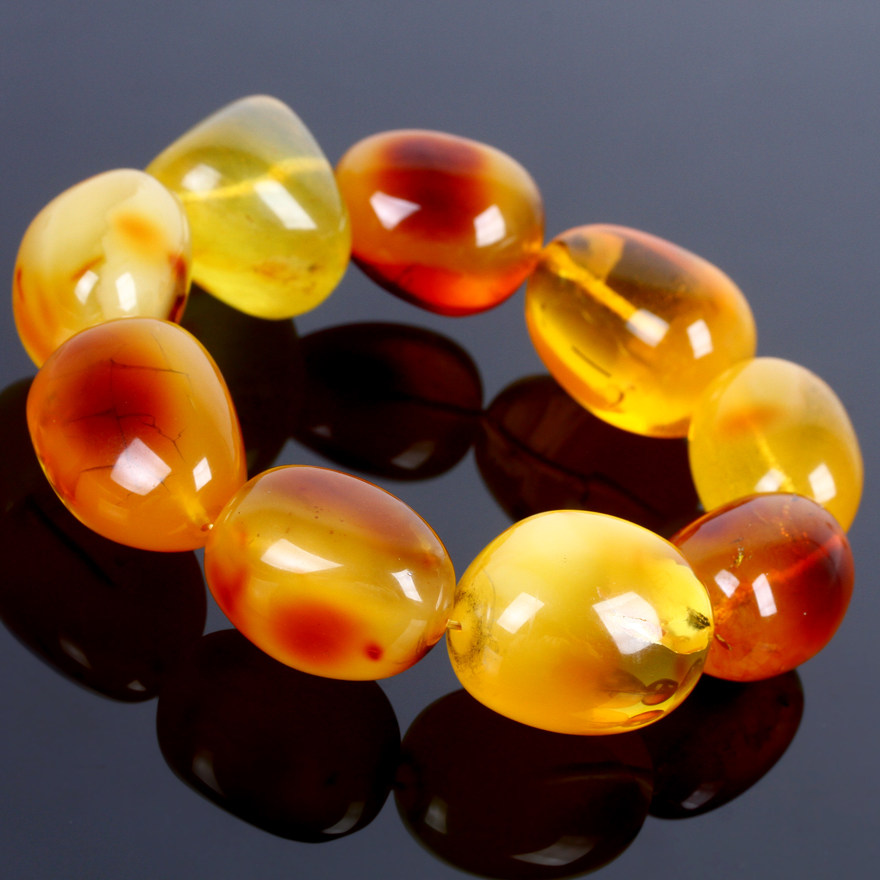 86克23.1mm原矿鸡油红蜜蜡大随形手串强荧光