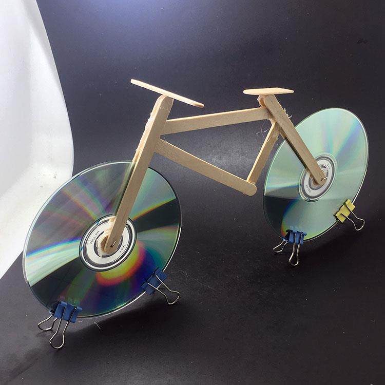 光盘手工变废为宝制作旧物利用废物改造幼儿园科学区探索材料玩具