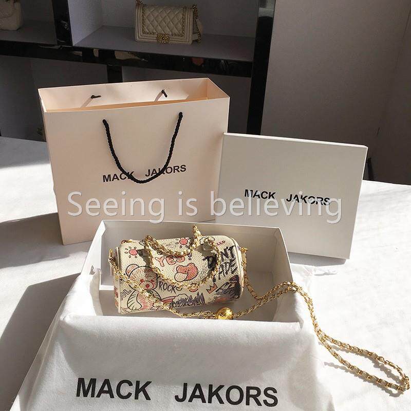 香港mackjakors正品真皮春夏涂鸦腋下圆筒枕头包女链条单肩斜挎包