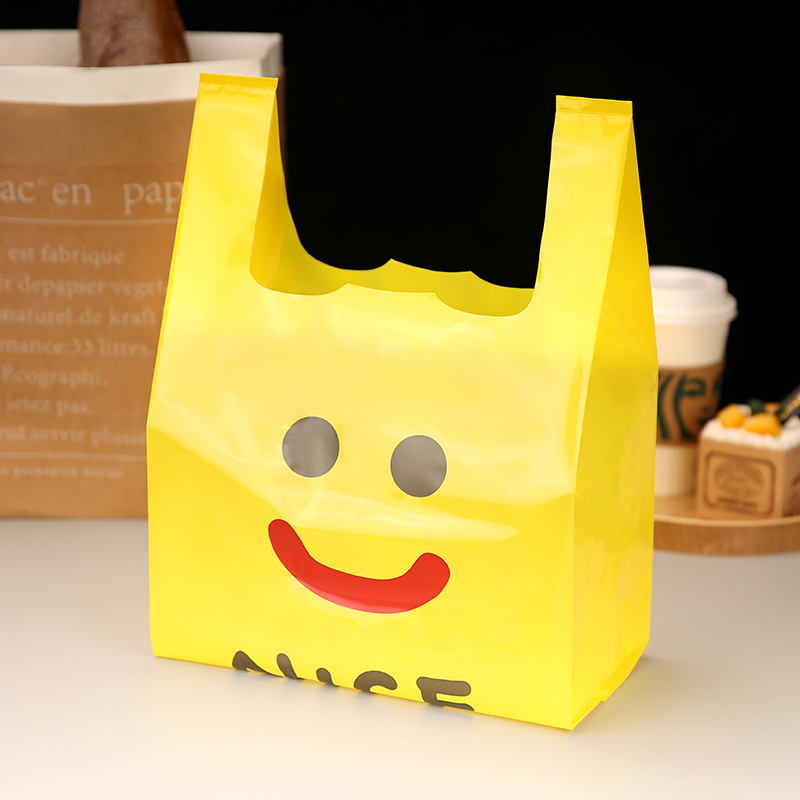 加厚黄色呆萌笑脸打包袋塑料打包袋背心袋网红零食餐饮烘焙小吃袋
