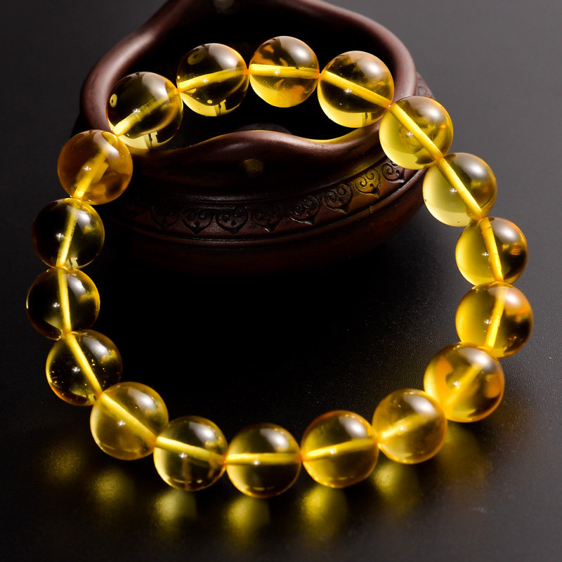 70g 10.95mm 精选金珀圆珠手链【强荧光】