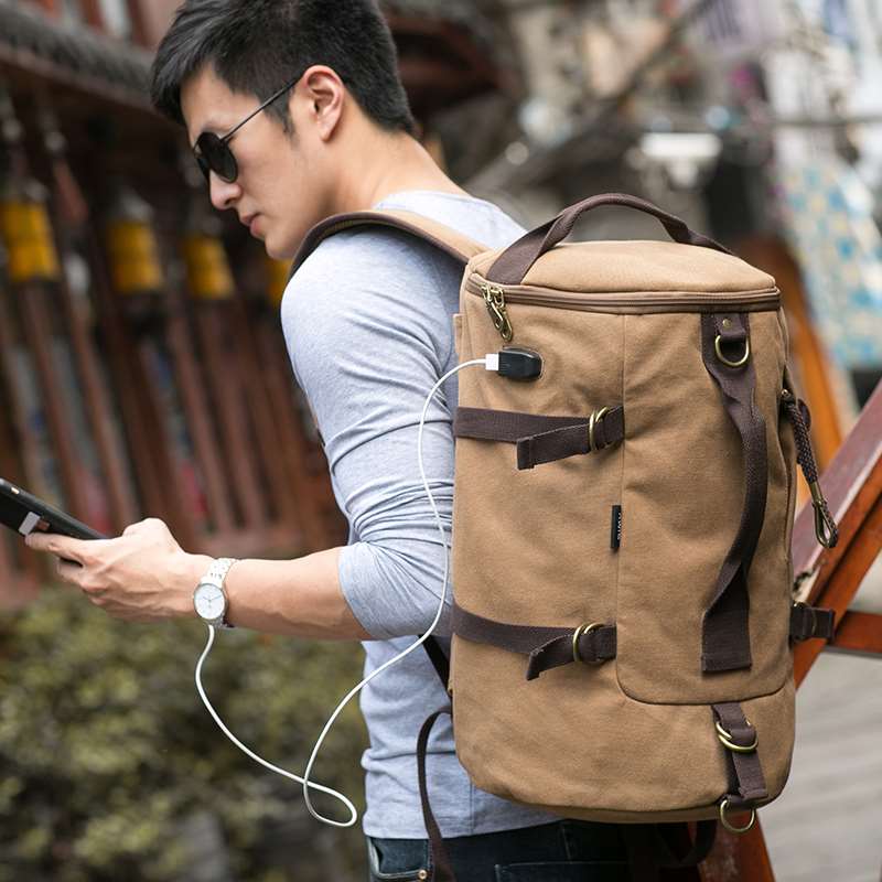 思牧新款帆布运动双肩圆桶旅游男女户外休闲旅行青年电脑纯色百搭