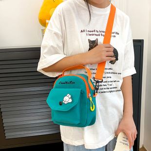 日系慵懒风帆布包女2023新款可爱小包包少女学生手机包单肩斜挎包