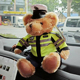 女副驾驶汽车交警警察泰迪熊装饰品摆件卡通竹炭包车内去味吸甲醛