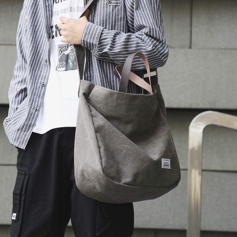 斜挎包潮男帆布