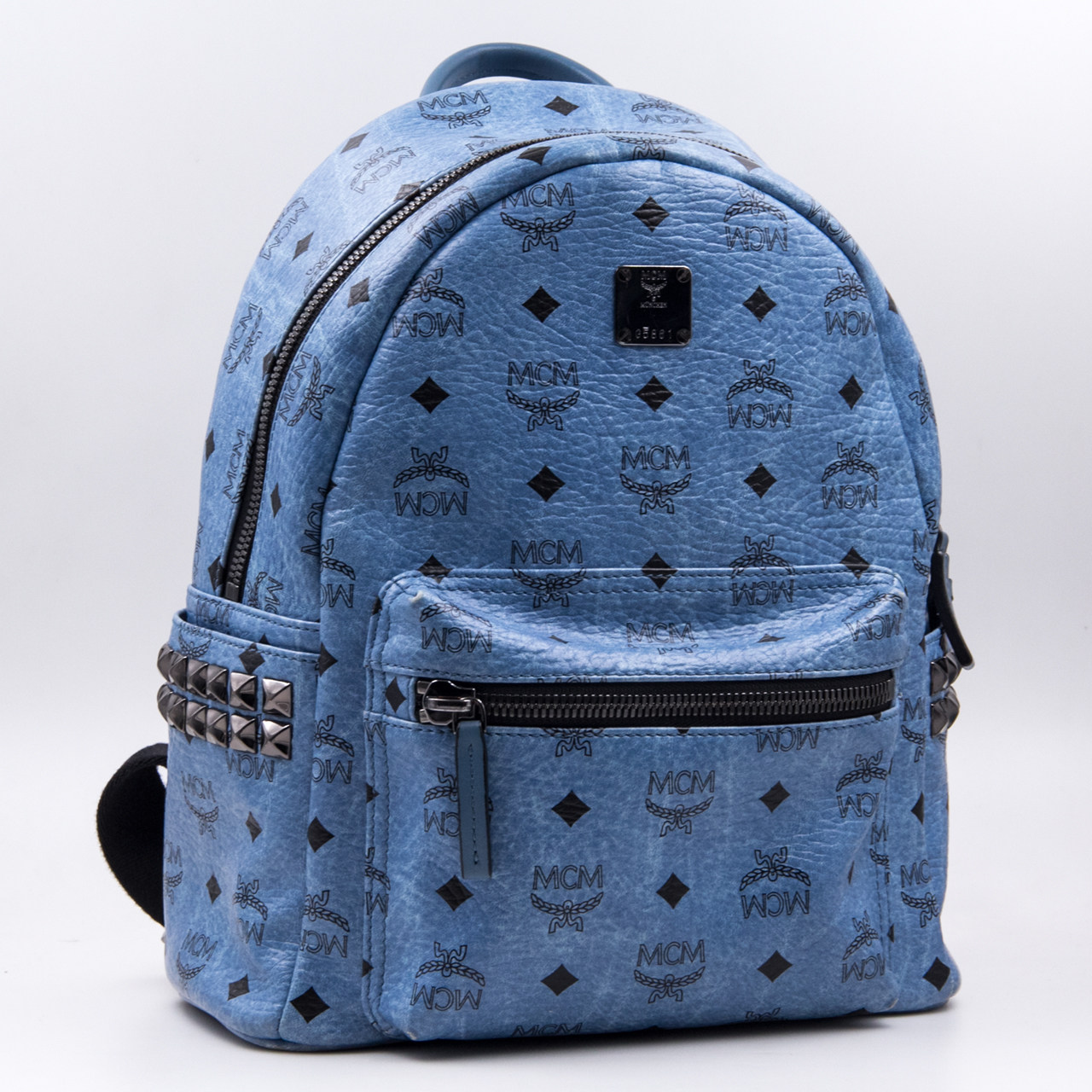 9.0新〕mcm中性stark backpack浅蓝色侧铆钉双肩包