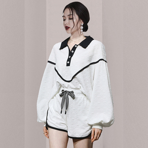 2022 spring new Korean casual slim knitted lantern sleeves black and white contrast LACE UP SHORTS SET