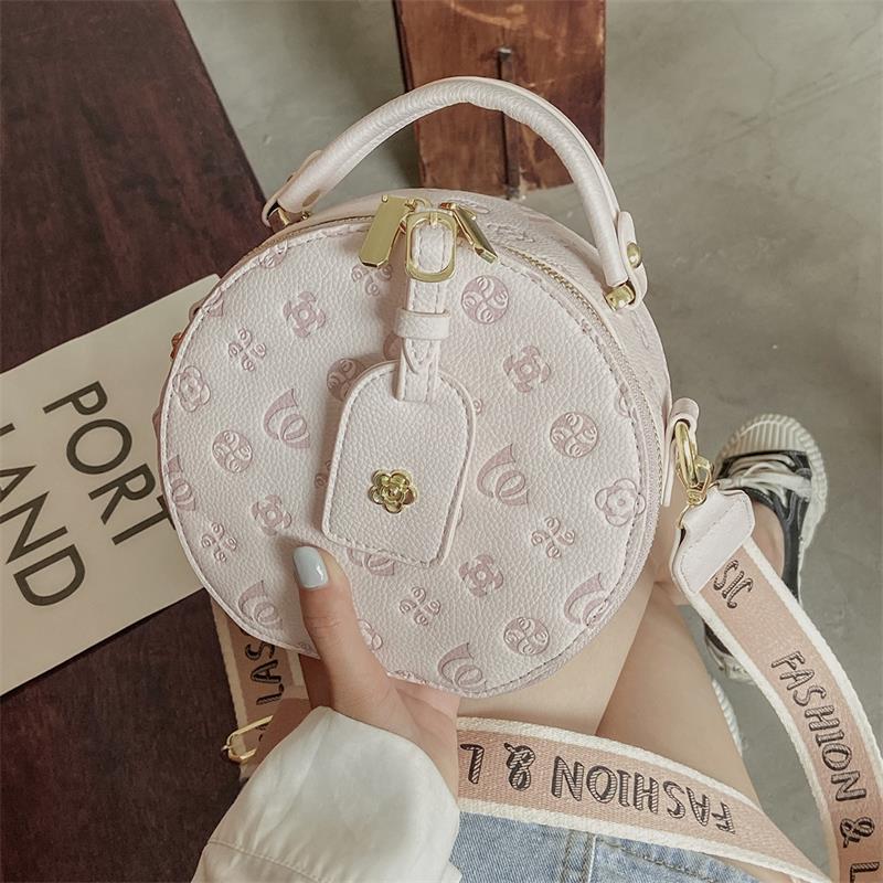 宽肩带圆饼包包女2021夏季新款甜美淑女手提小圆包单肩斜挎压花包