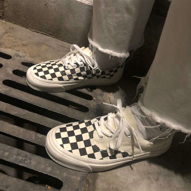 VANS 黑白低帮不规则拼接棋盘格ERA男女帆布滑板鞋 VN0A3WLRVPN