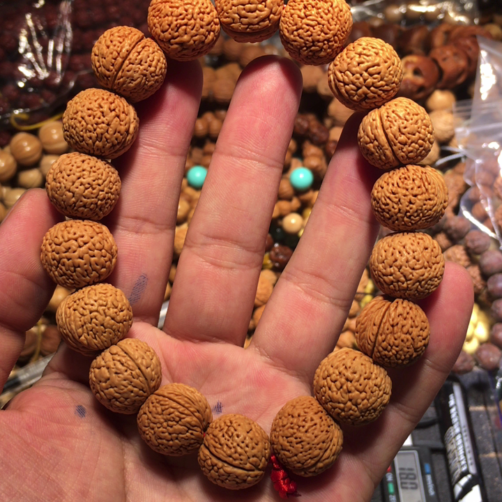 1.8凤羽桃核——老林文玩批发.