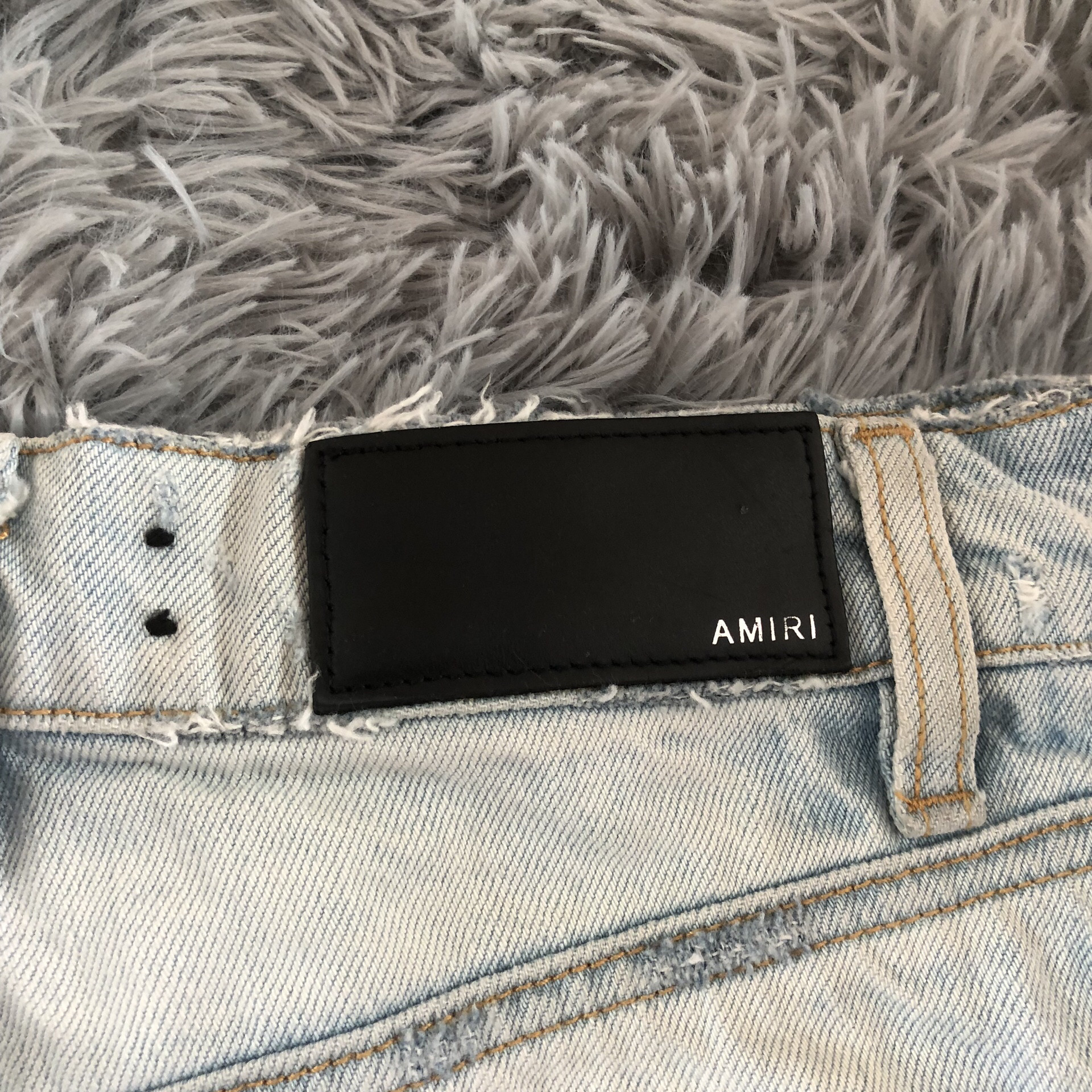 Amiri Light Blue Distressed Denim Skirt — label