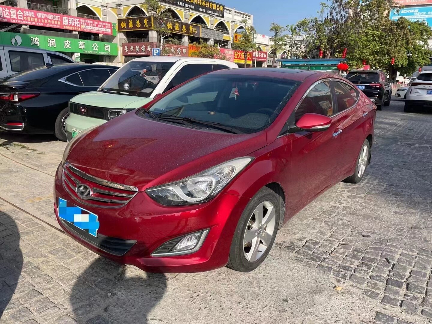 13年9月上牌现代朗动16自动高配带电动座椅智能钥匙