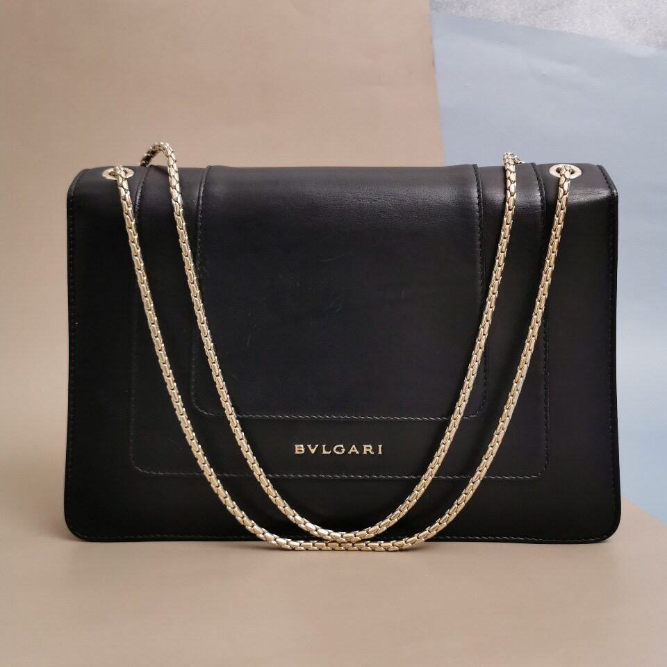 直播[9新]宝格丽黑色拼棕色小牛皮黑白珐琅孔雀石蛇头翻盖包