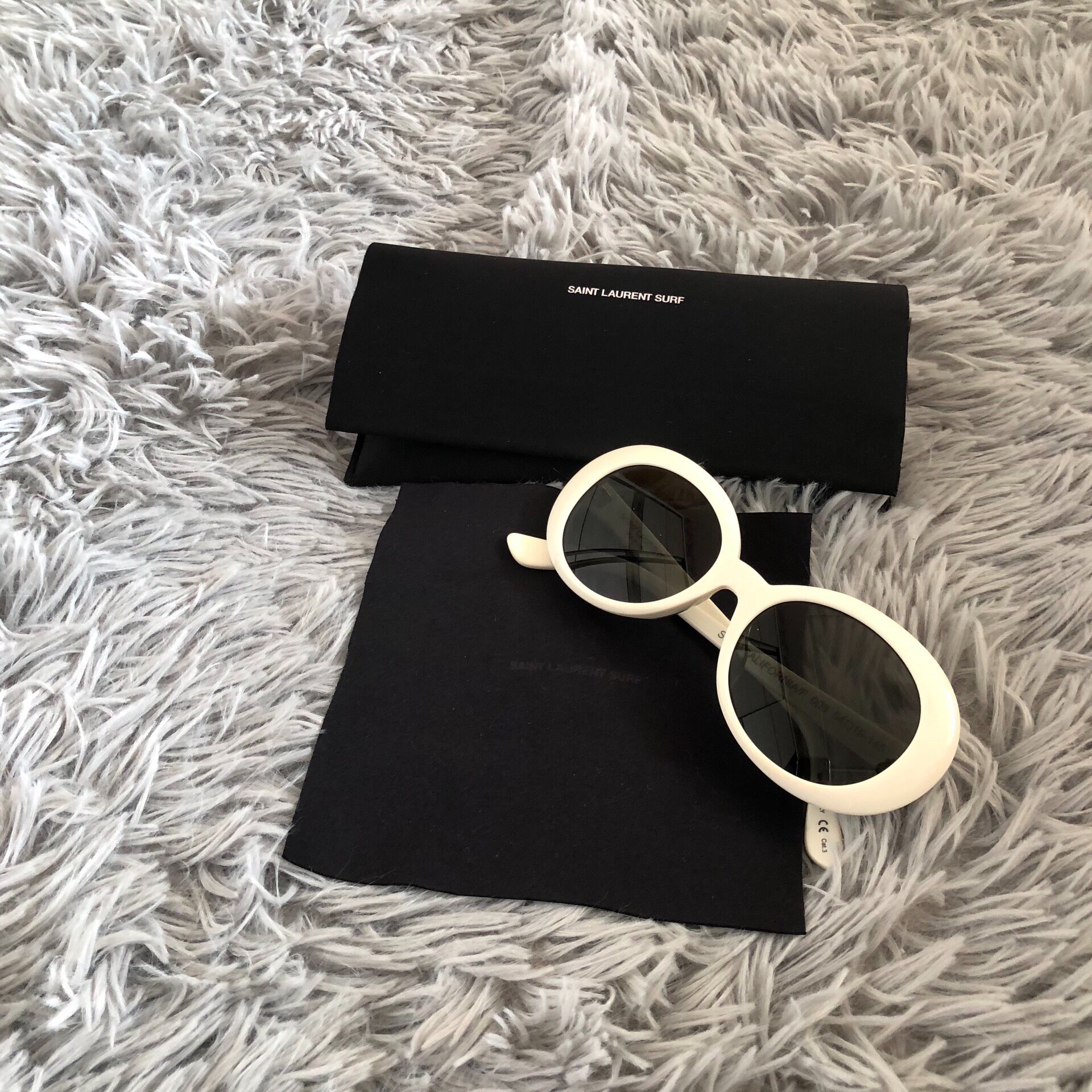 Saint Laurent Ivory Round-Frame Sunglasses — label