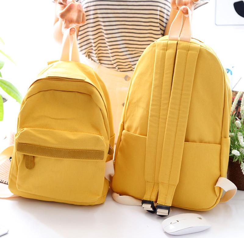 新款帆布双肩包简约纯色小书包图片