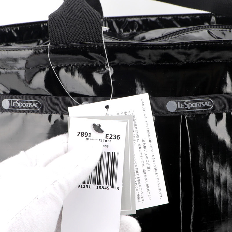 力士保新品黑色光泽防水面料单肩包