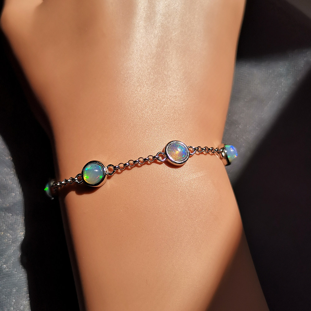 有鱼天然欧泊圆形可调调节手链s925纯银火彩手链
