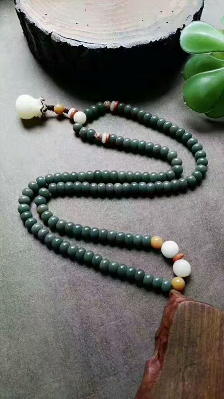 菩提天然绿皮风化绿色阴皮根手串提子原籽白玉佛珠