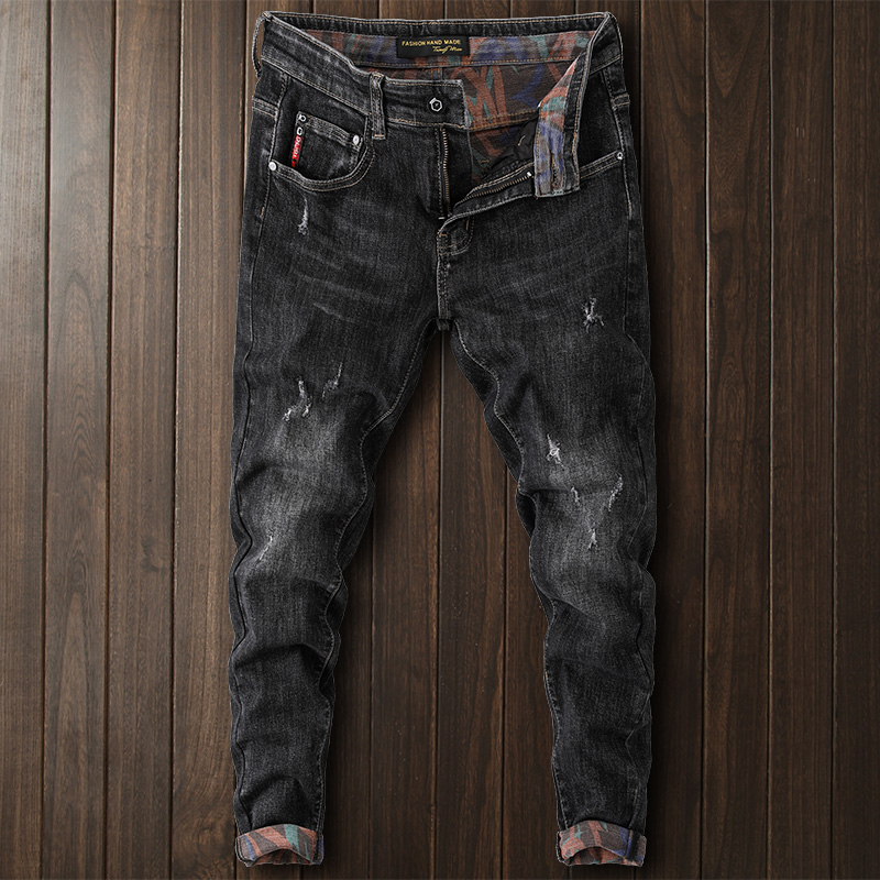 春季黑色翻边牛仔裤男破洞痞帅印花韩版修身高弹力小脚裤子显瘦潮