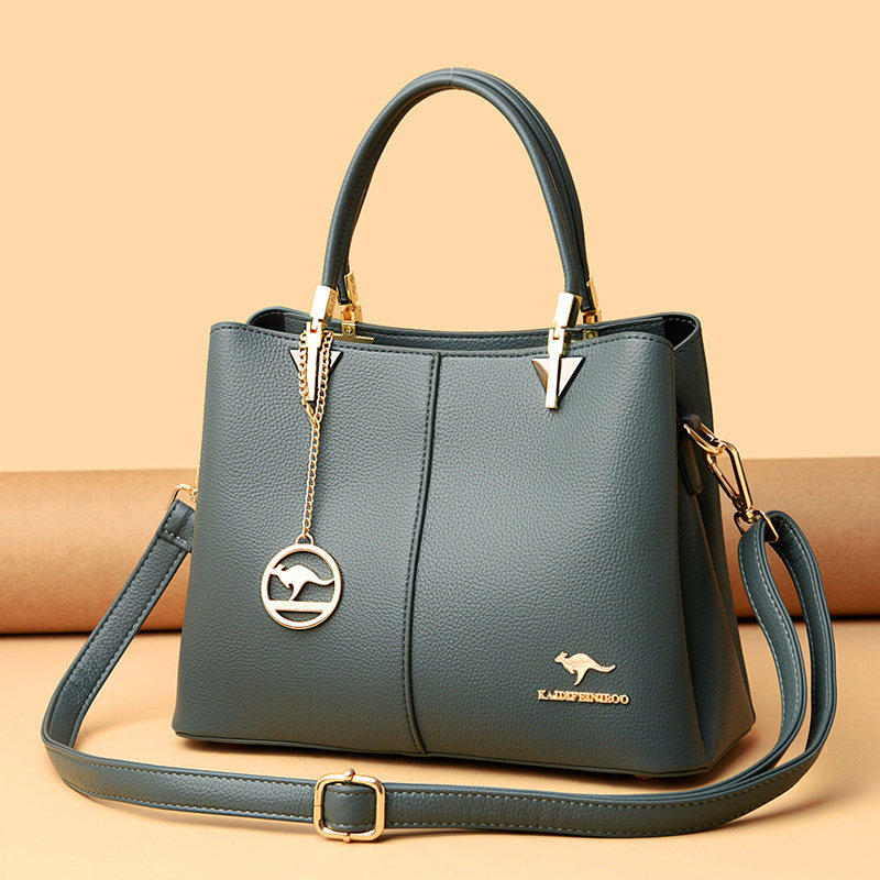 袋鼠包牛皮斜挎手提牛皮妈妈女士中年大气时尚通用款女包