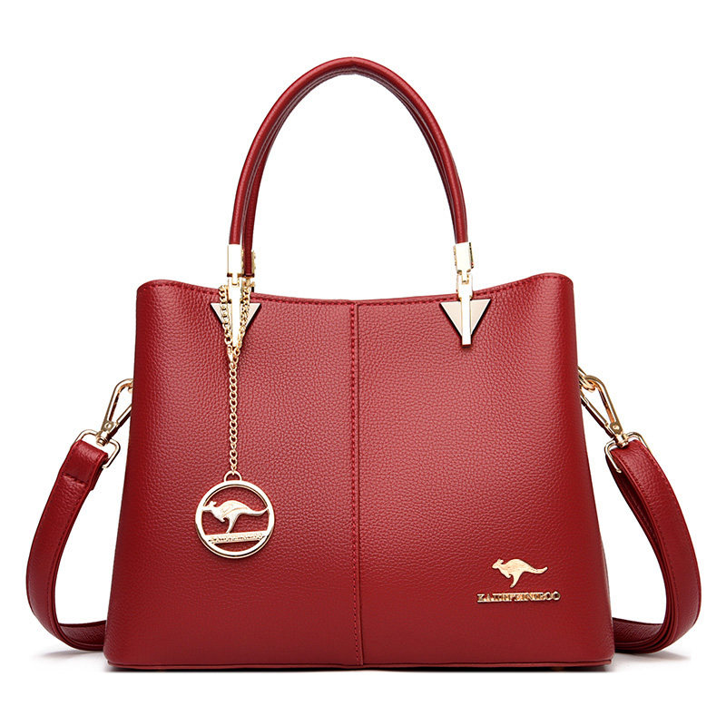 袋鼠包牛皮斜挎手提牛皮妈妈女士中年大气时尚通用款女包