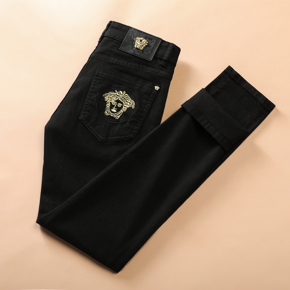 纯黑色牛仔裤男潮牌春秋季2022年新款修身小脚刺绣青年弹力长裤子