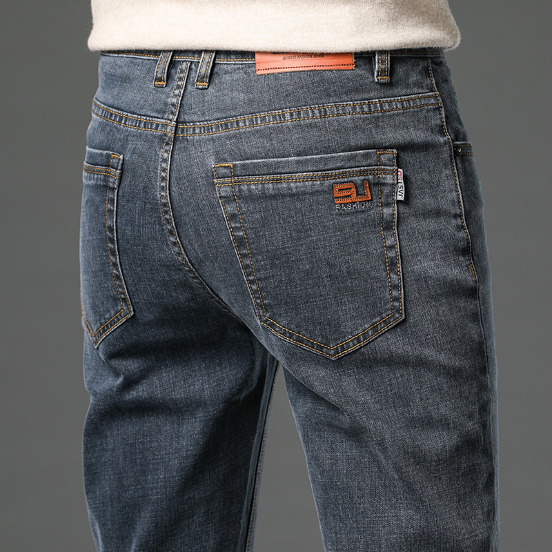 香港潮牌牛仔裤男修身直筒秋冬季男士高端商务弹力长裤子