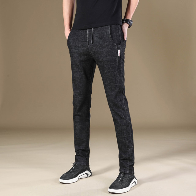 2020 winter plus velvet thick stretch jeans men's elastic waist slim fit feet warm long pants trend Korean version 2020 winter plus velvet thick stretch jeans men's elastic waist slim fit feet warm long pants trend Korean version