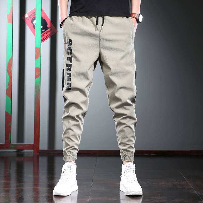 春秋款休闲裤男宽松束脚裤浅色百搭运动速干裤潮牌男士哈伦裤子
