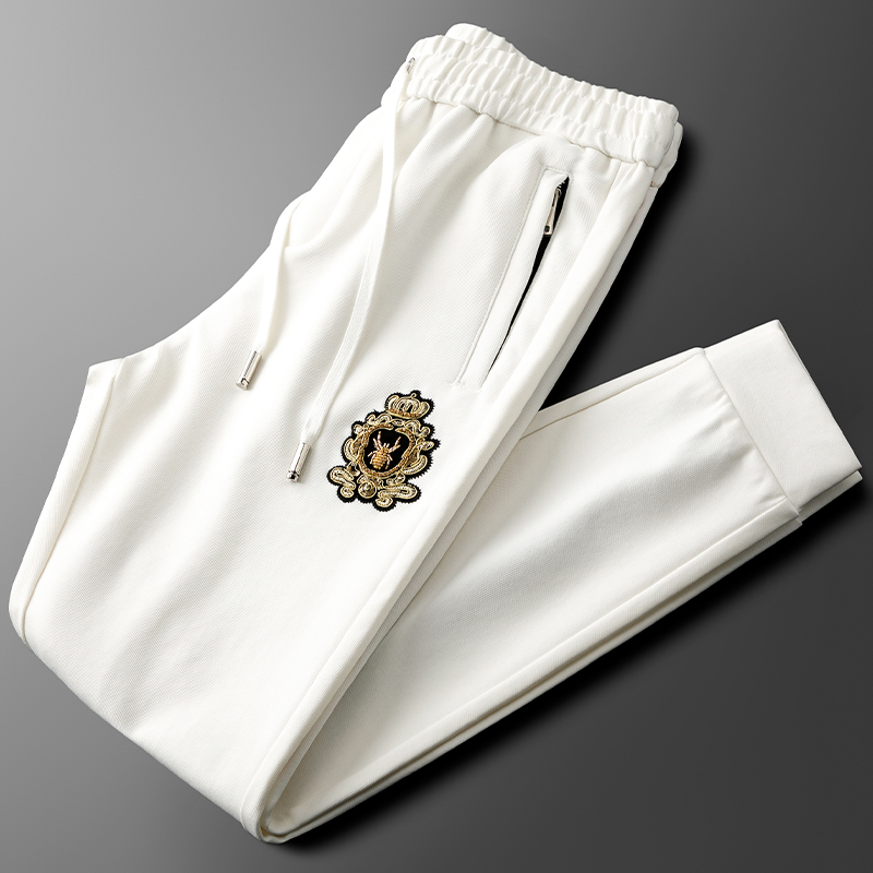 白色品质休闲运动裤男秋冬束脚抽绳徽章刺绣卫裤潮牌口袋拉链男裤