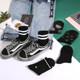 Black wave point socks children middle gums Korean college wind INS tide pure color wild black white striped students stockings Black wave point socks children middle gums Korean college wind INS tide pure color wild black white striped students stockings
