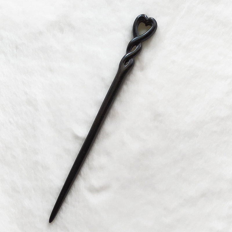 首页 下载app                          中国风黑檀木簪子镂空雕工