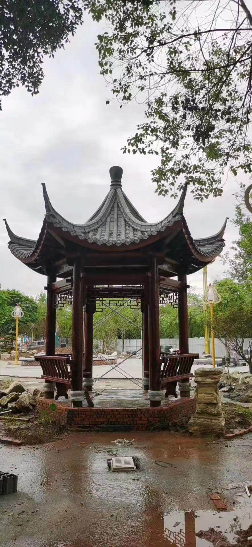 古建凉亭厂家直销碳化木防腐长廊户外六角实木木屋凉亭