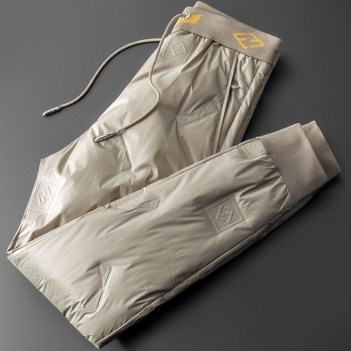 尼普奴轻奢户外御寒白鹅绒怪兽压胶情侣加厚防水小脚休闲羽绒裤男