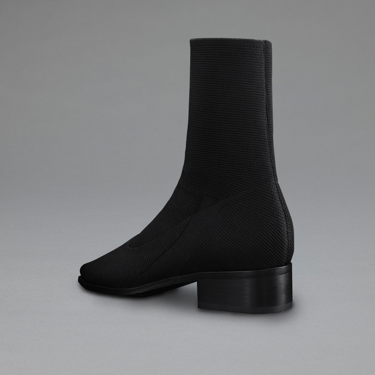 社交女鞋黑色弹力布粗低跟袜尖头时尚尚显百搭时装靴