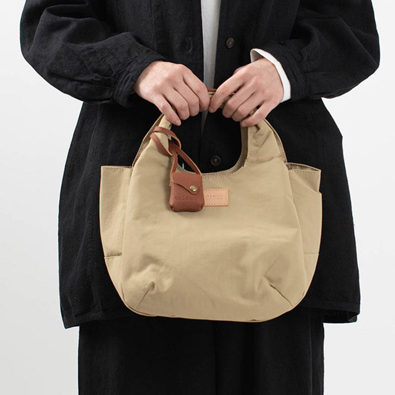 日本toleur尼龙罗缎皮革迷你手提包慵懒休闲简约通用款女包