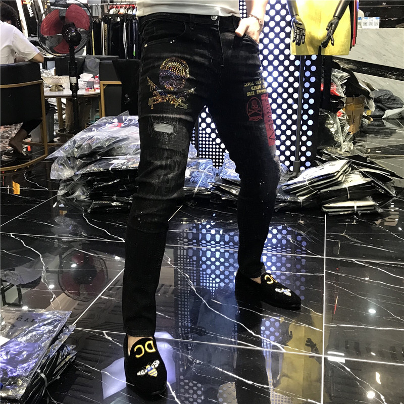 男士2022欧洲站网红潮牌裤子男时尚重工艺鬼头烫钻破洞牛仔裤男