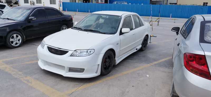 一代福美来大包包围改装适用于马自达海福星前后保险杠汽车包围