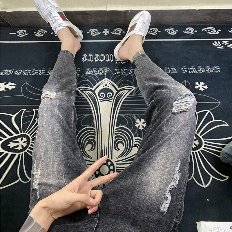 精神小伙九分裤子男夏季破洞牛仔裤潮快手同款百搭小脚修身束脚裤