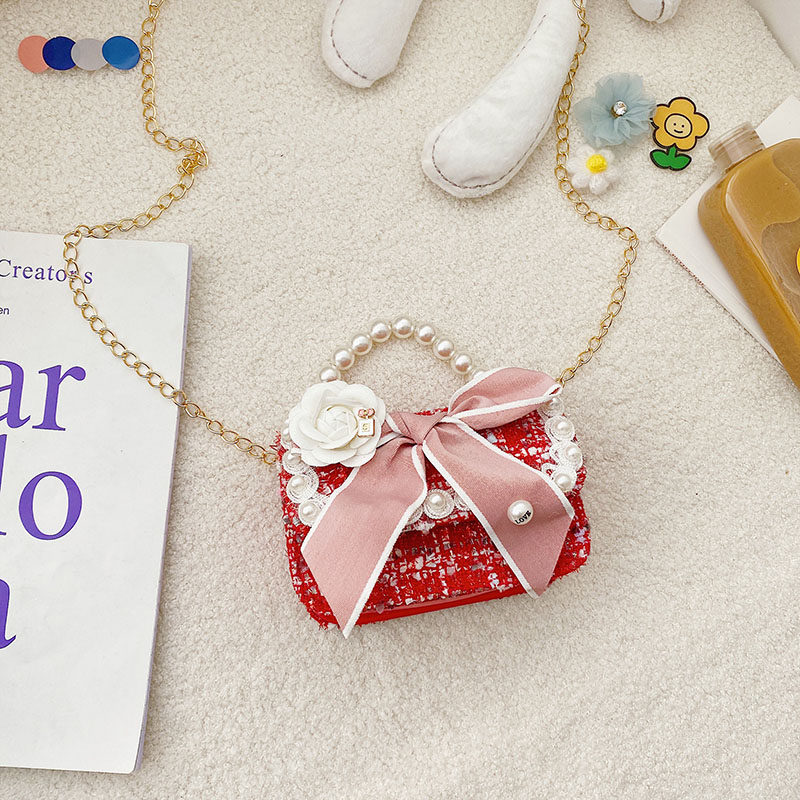 秋冬新款公主包甜美小女孩珍珠手拎包可爱蝴蝶结女童斜挎包配饰包