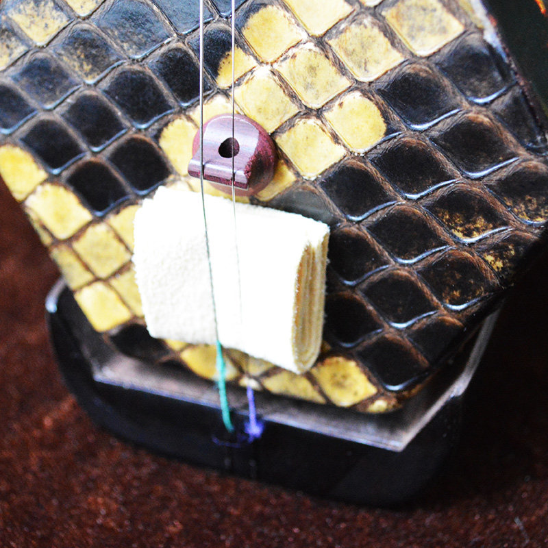 天然麂皮二胡音垫真皮滤音非常柔软消音音色其它乐器配件