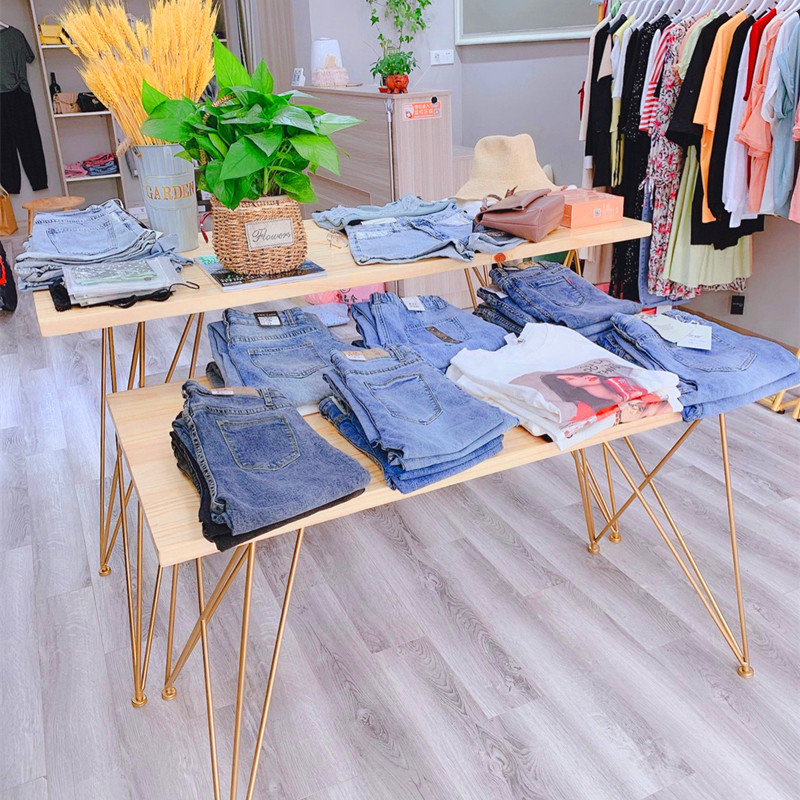 展示北欧女装服装店展示架中间摆放桌子实木童装服装展示架