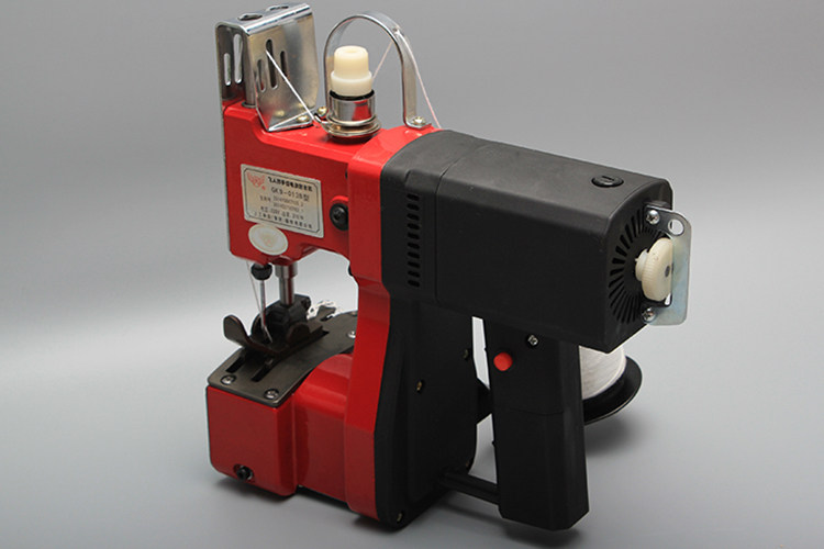 飞人gk9013b枪式手提电动包机封包机米编织编织袋缝纫机