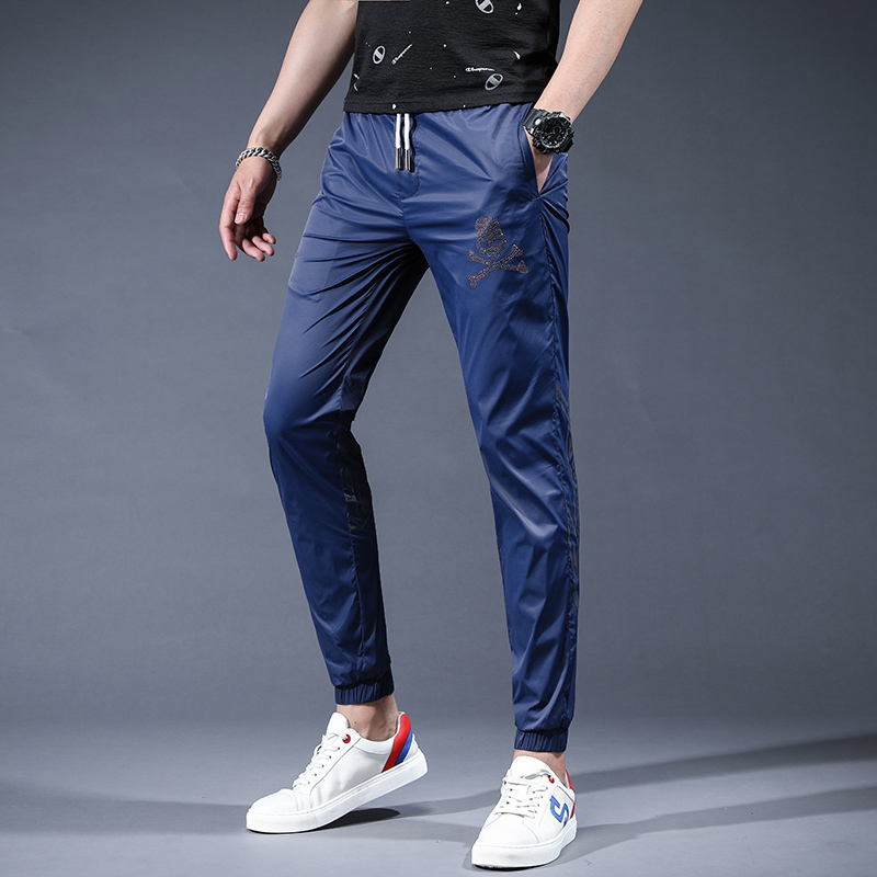 2022夏季潮牌烫钻骷颅头裤子男韩版潮流休闲裤超薄锦纶冰丝哈伦裤