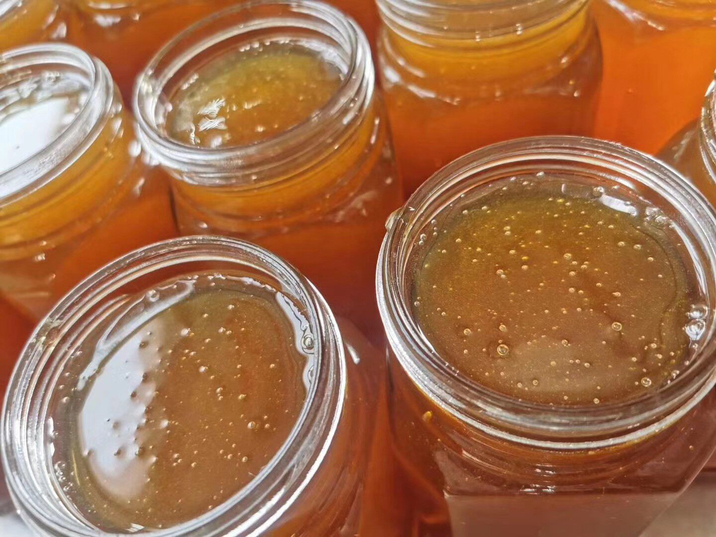 新疆阿克苏野生沙枣蜂蜜2斤瓶装食用花蜜营养蜂蜜