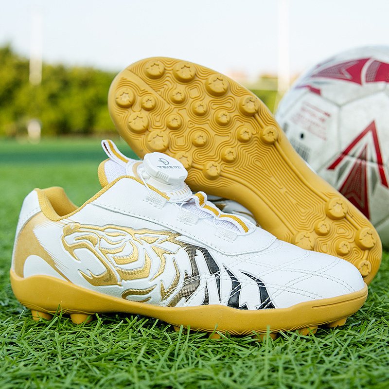 华强回力旋转钮扣儿童足球鞋男童小学生碎钉球鞋tf足球鞋