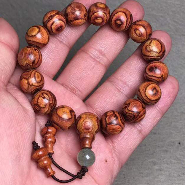 海南黄花梨14mm佛珠手串颗颗鬼眼鬼脸对眼黄金佛珠