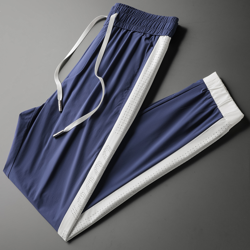 夏季轻奢镂空冰丝速干裤子男韩版潮流休闲时尚薄款运动裤蓝色裤子